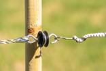 Gate handle insulator with thimble