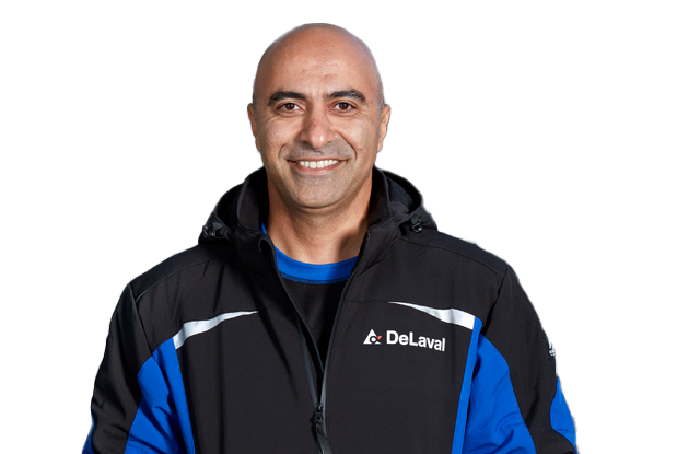 DeLaval dealer in overall smiling